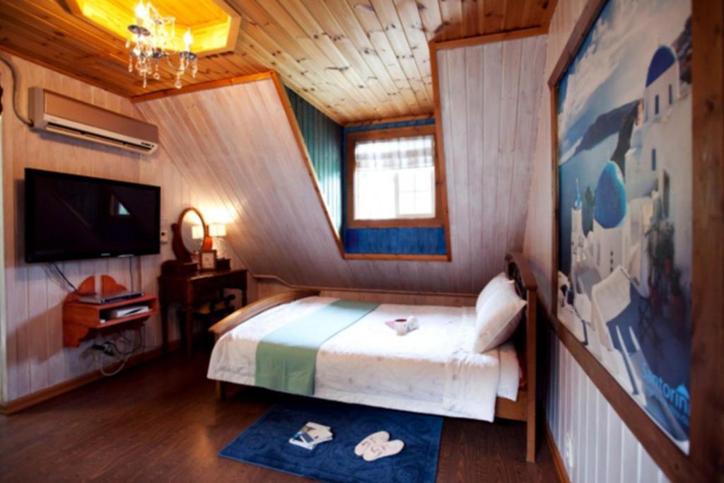 Gyeongju Jy Pension Rum bild